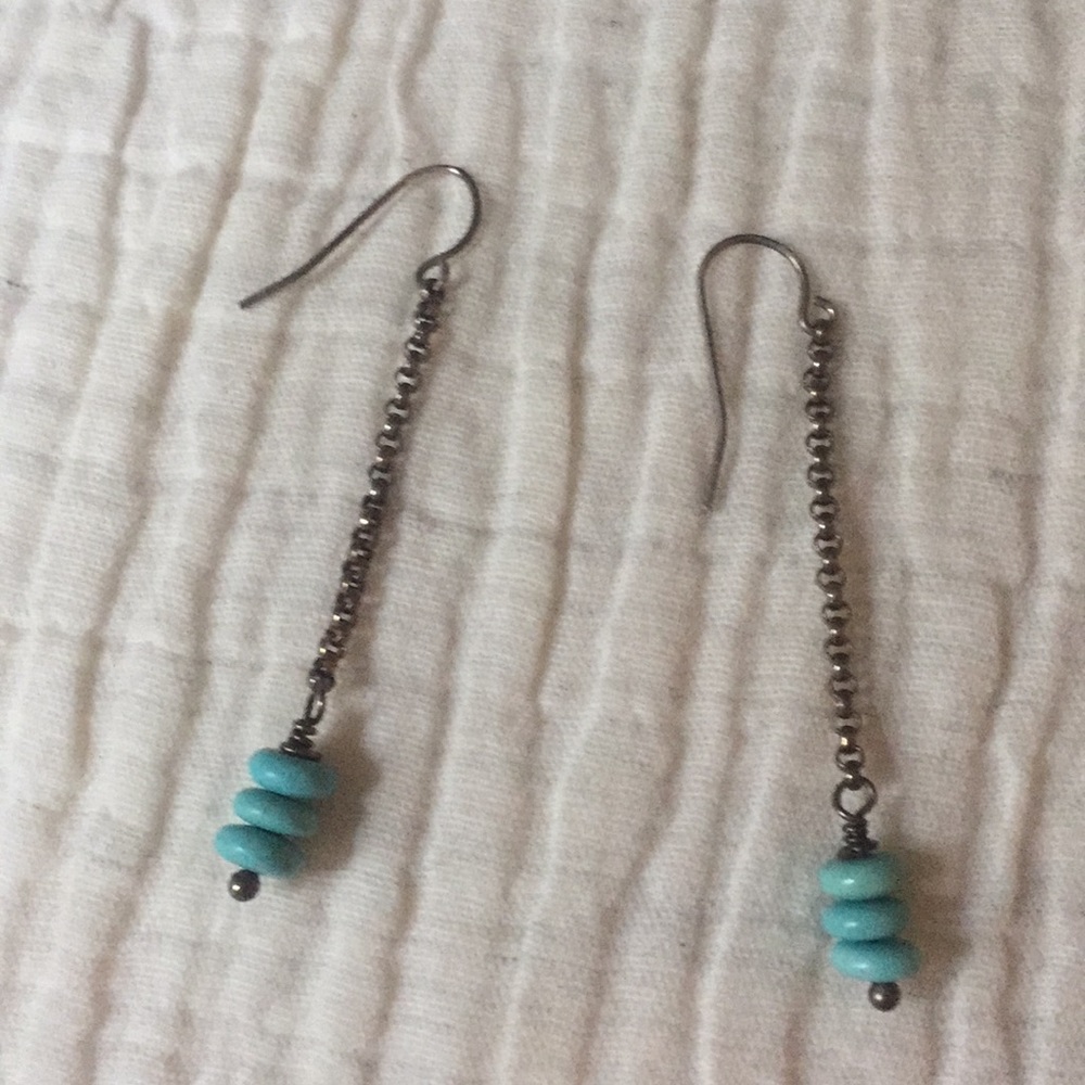 Earrings with blue stone